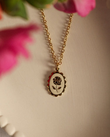 Pink enameled medal necklace