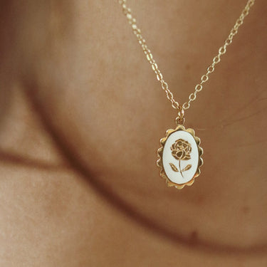 Pink enameled medal necklace